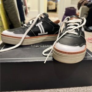 Lucchese black & white fashion tennis shoes. Very cute, only worn once!